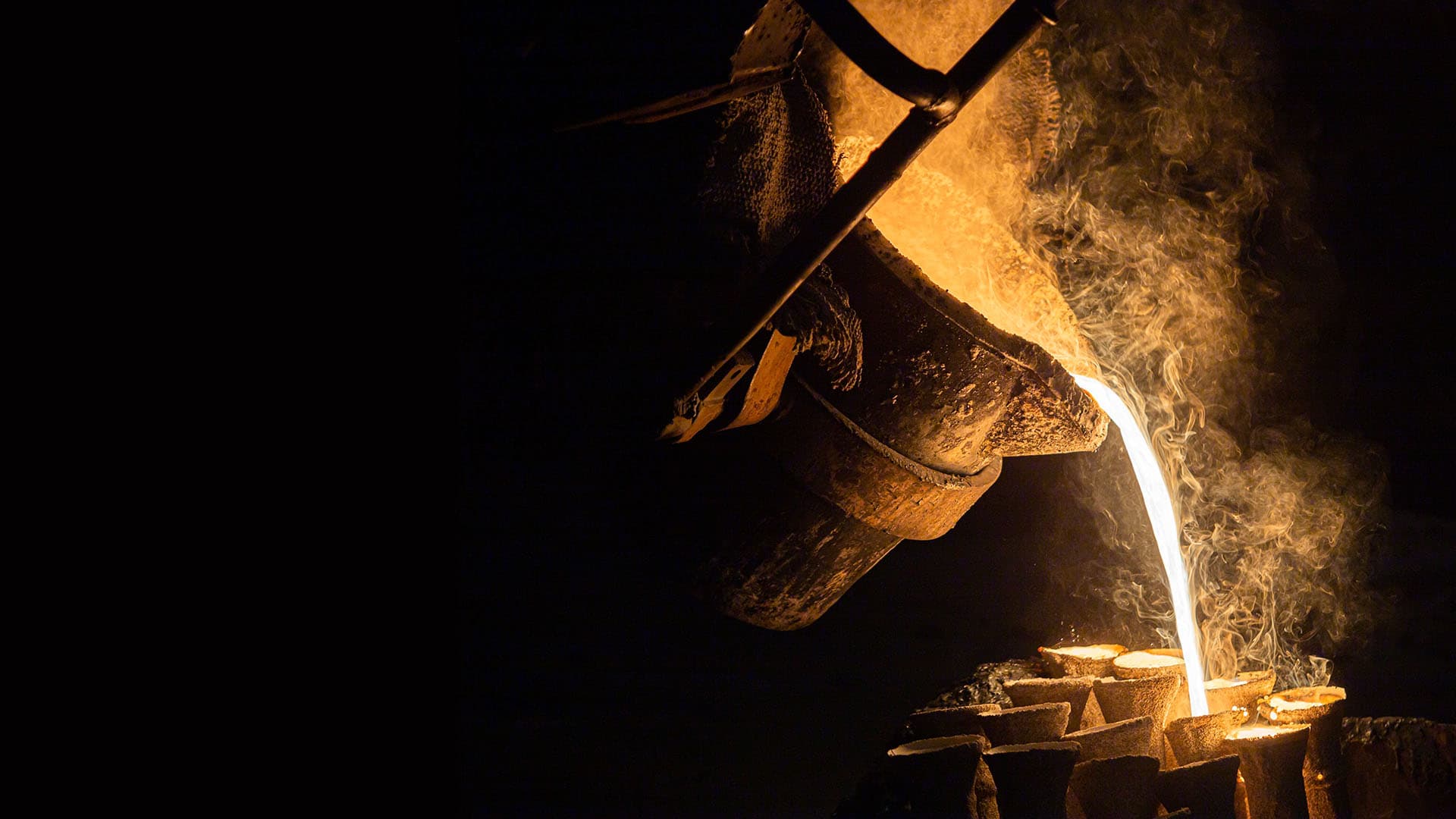 Induction Smelting Furnace pouring molten metal